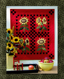 Summers Last Bloom - "Floral" Collection - Pattern - # Q07 - With their large seed heads and blazing yellow petals, sunflowers command attention in any garden. Not only do they nourish our bodies, they provide beauty for our eyes. They were an inspiration for Van Gogh and continue to inspire us today. This graphic quilt captures the last rays of summer sun and will brighten any home during the dark winter months. It combines the strip-piecing and appliqué quilting methods. It would also be wonderful with a bright blue background. 