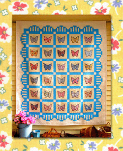 Vintage Butterfly - "Nostalgia" Collection - Pattern - #Q40 - While perusing my favorite antique shop I ran across thirty butterflies cut from some great old 1920’s -1940’s fabrics. The scant seam allowance had already been pressed under and basted by a quilter from the past - what a treasure! I combined these beauties from the past with an interesting border to create this butterfly quilt. An easy strip-piecing method is used for the border to create a “scalloped” look. The butterflies are appliquéd and finished with a blanket stitch. To that quilter from the past: your quilt is complete.